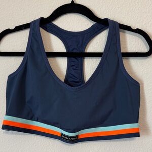 Savage X Fenty Deep Blue Sports Bra with Orange and Light Blue Accents